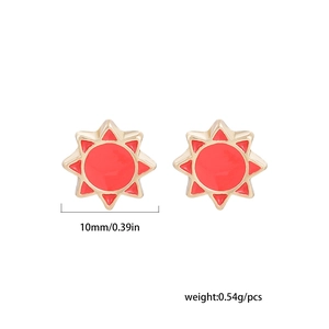 Detail shot of red star earrings showing 10mm size and lightweight 0.54g metal base