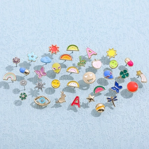 Y2K style colorful enamel stud earring set featuring butterfly and smiley face designs