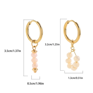 Y2K gold hoop earrings featuring pink vertical beads and yellow circular bead accents