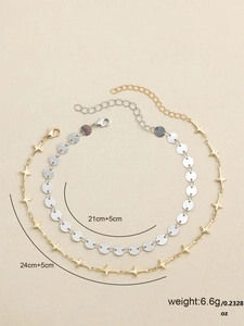 Detailansicht mehrlagiger 18K Gold- und Silber-Fußkettchen mit Sternen und Maßangaben