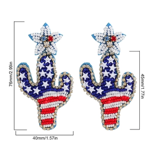 Detailed view of red, white, and blue beaded cactus earrings with size dimensions shown