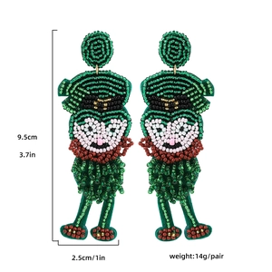 Close-up of beaded leprechaun earrings for St. Patrick's Day party showing 9.5cm length