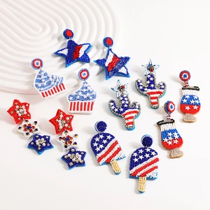 Handmade beaded star and cupcake earrings in red white and blue for Independence Day