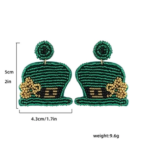 Detail shot of green beaded St. Patrick's Day hat earrings with dimensions and weight info