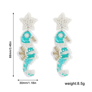Dimensions détaillées des boucles d'oreilles hippocampe avec étoile de mer et perles