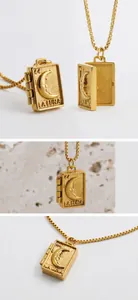 Golden book locket pendant with moon relief and fine chain shown from multiple angles