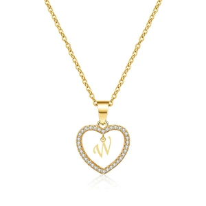 Detailed view of heart-shaped pendant necklace with cubic zirconia and the letter W