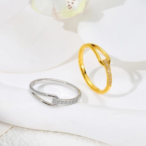 U-shaped interlocking titanium steel rings with pavé crystals in gold and silver