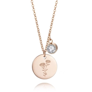 Vue détaillée du collier en titane rose gold avec pendentif marguerite et zircon