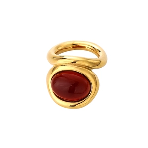 Vintage gold-plated titanium ring featuring a large oval brownish-red malachite gemstone
