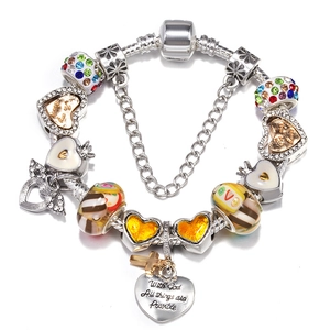Pandora-style silver bracelet with snowflake charms and heart pendant with engraving