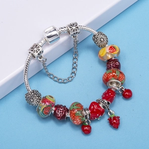 Silver snake chain bracelet featuring strawberry charms and colorful fruit themed beads