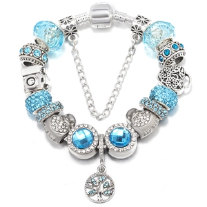 Pulsera de plata con cuentas de vidrio azul, dijes de corazón y colgante árbol de vida