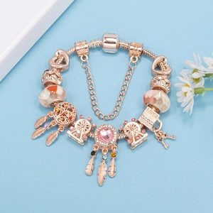 Roségoldenes Schlangenarmband mit Riesenrad, Traumfänger-Anhängern und bunten Zirkonen