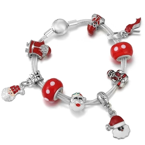 Christmas themed silver snake chain bracelet with Santa Claus and red enamel charms
