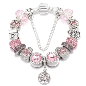 Pastel pink crystal charm bracelet with silver snake chain and heart tree pendants