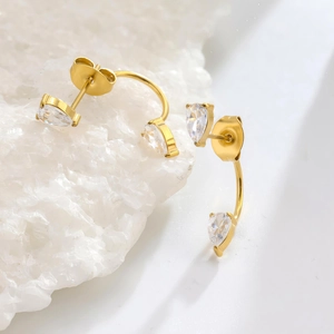 Elegant gold-plated titanium steel earrings featuring four pear-cut zircon crystals
