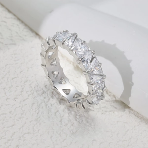 Polished titanium steel ring with full triangle-cut clear stones and hollowed-out base