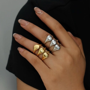 Floral and celestial engraved signet rings in gold and silver stainless steel