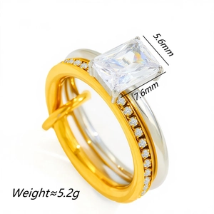 Detail view of double-tone stainless steel ring with rectangular gem and micro pave side stones