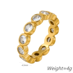 Minimalist gold plated stainless steel ring with 4.5mm zircon inlay on white background
