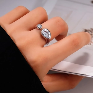 Adjustable silver ring with pear-shaped cubic zirconia and minimalist double-end design