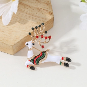 Christmas reindeer brooch with white enamel finish and colorful rhinestones on wood