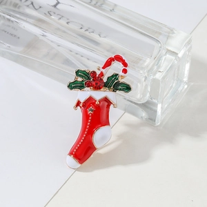 Christmas stocking brooch with candy cane and holly leaves in red enamel and gold finish