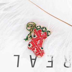 Christmas stocking brooch with red enamel gold stars and green rhinestones jewelry