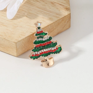 Golden Christmas tree brooch with green enamel and sparkling colorful rhinestones
