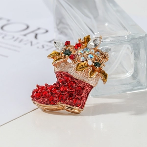 Elegant Christmas boot brooch with red rhinestones on a gold alloy base and colorful gems