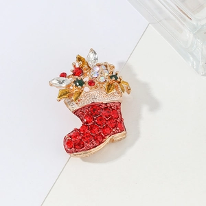 Sparkling Christmas boot brooch with red and green rhinestones in a gold alloy setting