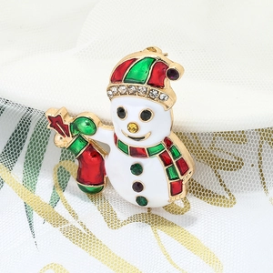 Luxury snowman napkin ring with colorful enamel and sparkling rhinestones for table decor