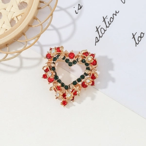 Broche couronne de fleurs en forme de cœur avec cristaux rouges et verts dorés