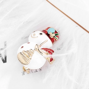 Exquisite Christmas snowman brooch with white enamel and red scarf on decorative feather
