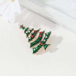 Christmas tree brooch with green enamel and sparkling red and white rhinestones