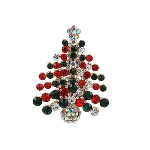 Golden Christmas tree brooch with colorful rhinestones and crystal flower on white background