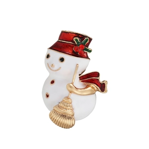Exquisite Christmas snowman brooch with red enamel hat and golden broom detail