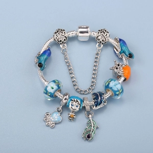 Pandora style bracelet with blue glass beads and colorful cartoon boy owl charms