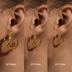 Gold chunky C-shaped twisted earrings with textured finish in three sizes for women