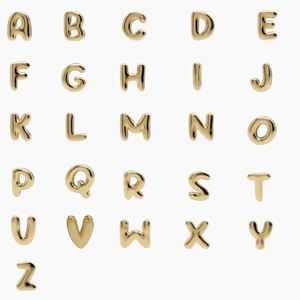 Full set of 26 golden 3D balloon style alphabet letter pendants in a neat grid display