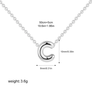 Detail showing dimensions and silver letter C pendant on stainless steel chain necklace