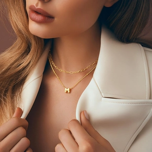 Double-layered gold paperclip and bead chain necklace with 3D bubble letter M pendant