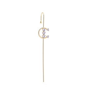 Detailed view of a gold-plated C-shaped ear crawler with five white zircon stones