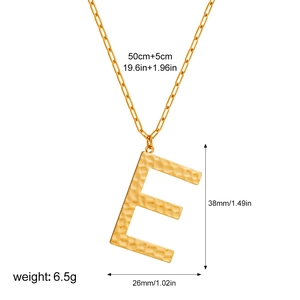 Detailed size specs for golden letter E pendant with paperclip chain and hammered texture