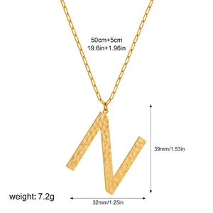 Detailed view of large gold letter N pendant necklace with dimensions and weight info