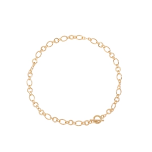 Detailed macro of gold-toned alloy chain necklace with retro textured links and toggle clasp