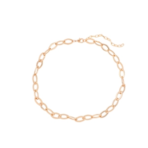 Macro detail of gold chunky link chain with adjustable lobster clasp and extender