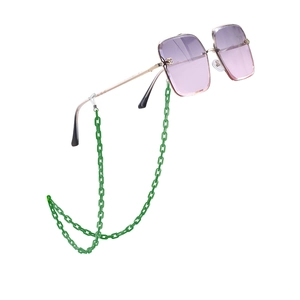 Y2K square sunglasses with gradient pink lenses and chunky green acrylic chain strap
