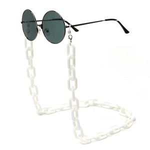 Detail of chunky white acrylic eyewear chain with vintage sunglasses and silver lobster clips